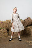 BEBE ORGANIC COLETTE SMALL FLOWER PRINT WITH SIDE TIES TIERED DRESS