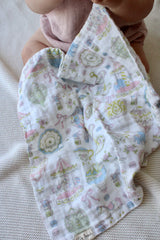 LITTLE THREADS CAROUSEL MUSLIN BLANKET