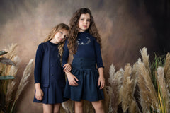 BELATI KNIT SWEATER WITH EMBROIDERED DETAIL AND NECK RIBBON