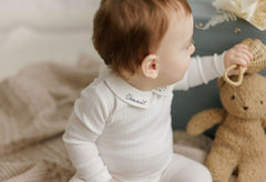 ELYS & CO. 2PC FLORAL STAR EMBROIDERED COLLAR FOOTIE + BONNET SET