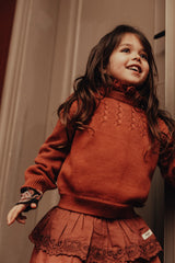BAJE RUFFLE COLLAR KNIT SWEATER