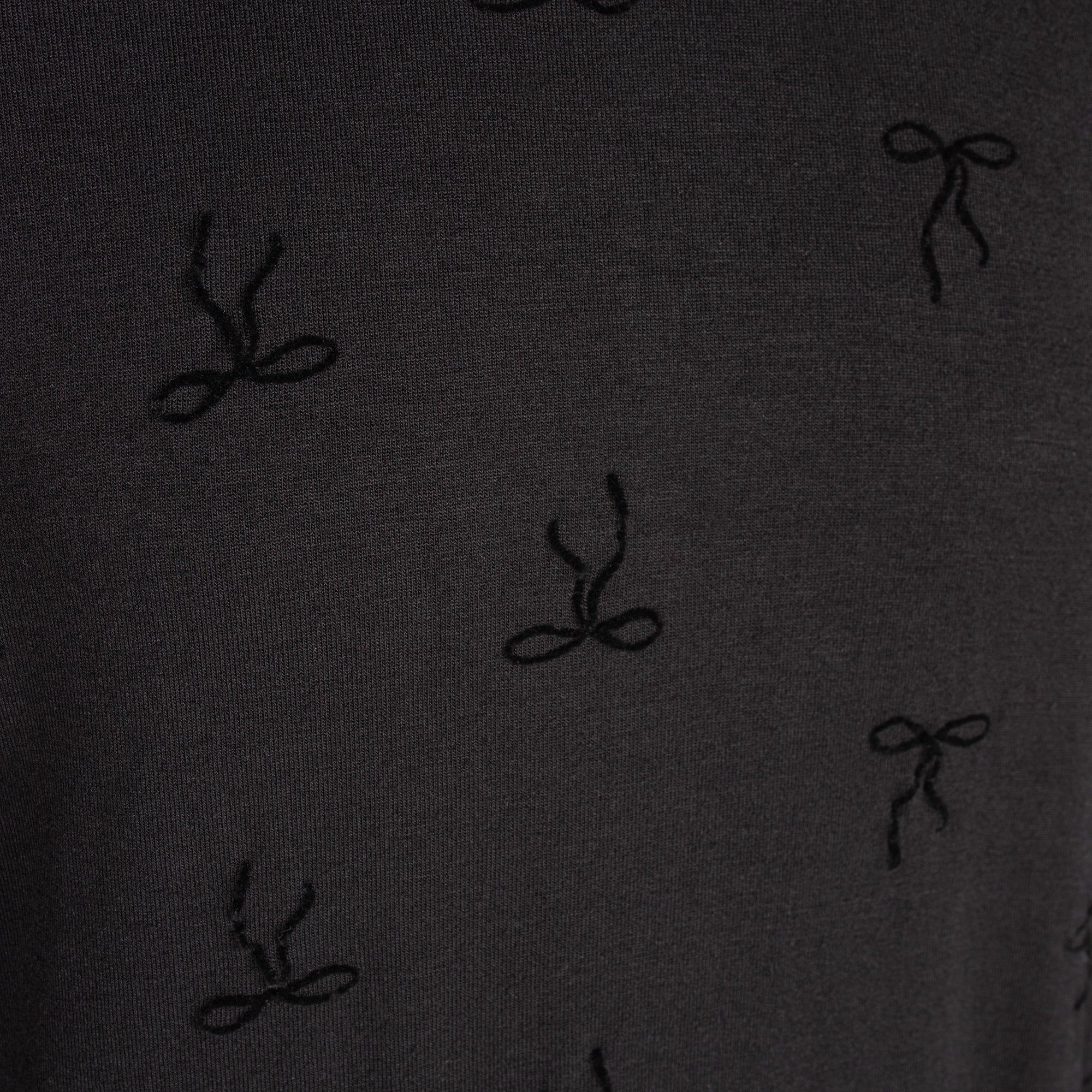 POET ARIA LONG SLEEVE MOCKNECK BLACK ON BLACK BOW PRINT SHIRT