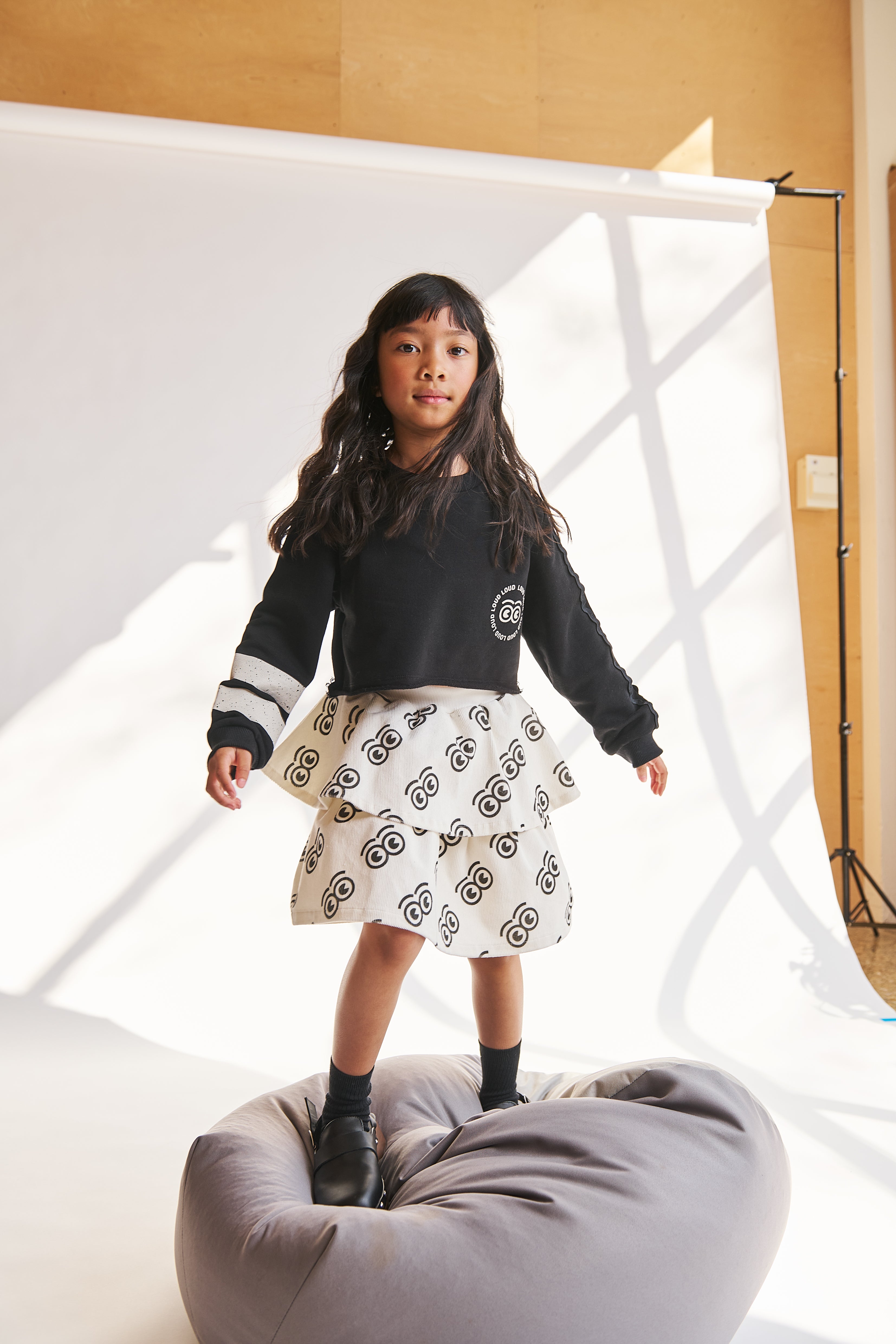 LOUD APPAREL "NURTURE" LOGO EYES ALLOVER PRINT SKIRT