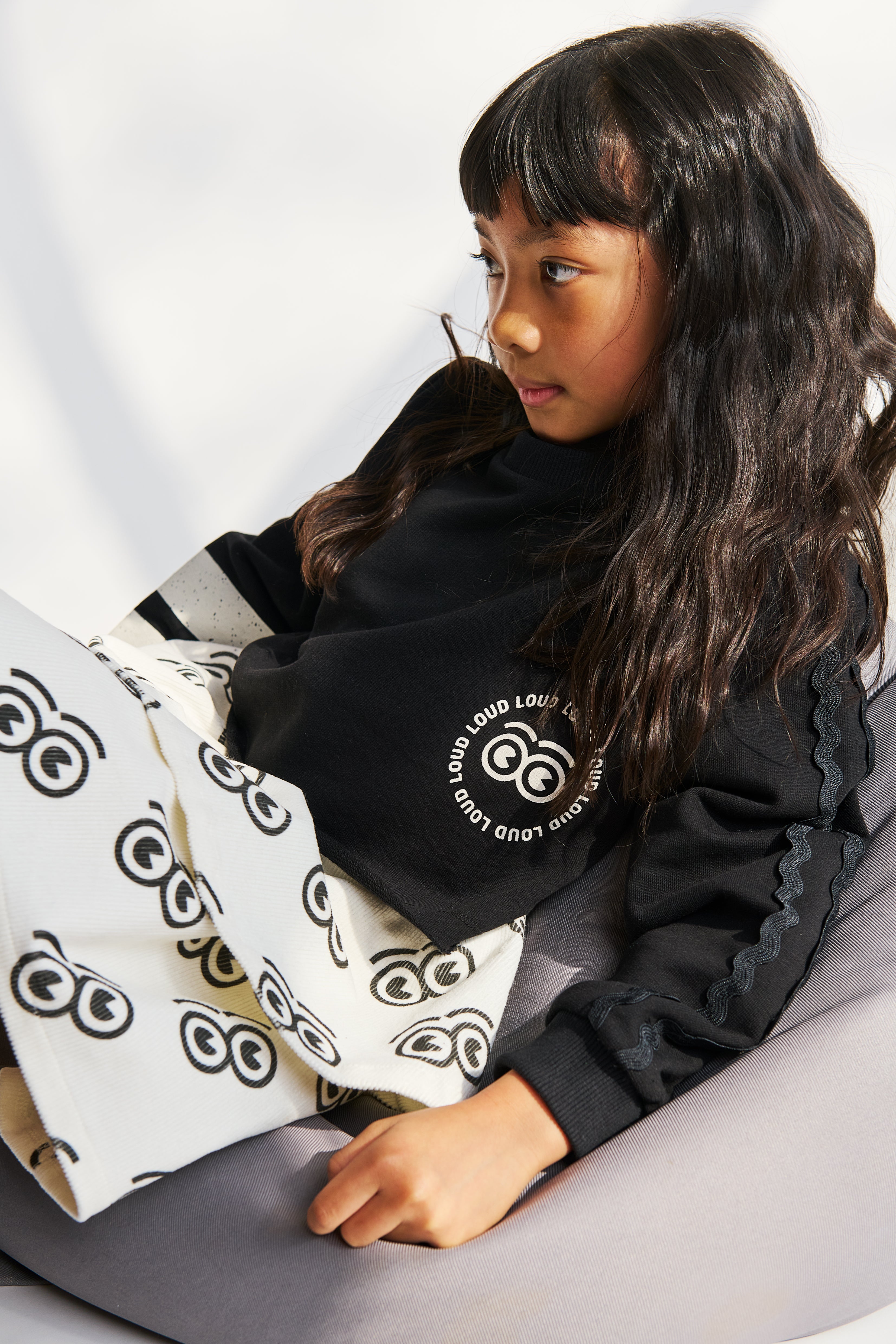 LOUD APPAREL "NURTURE" LOGO EYES ALLOVER PRINT SKIRT