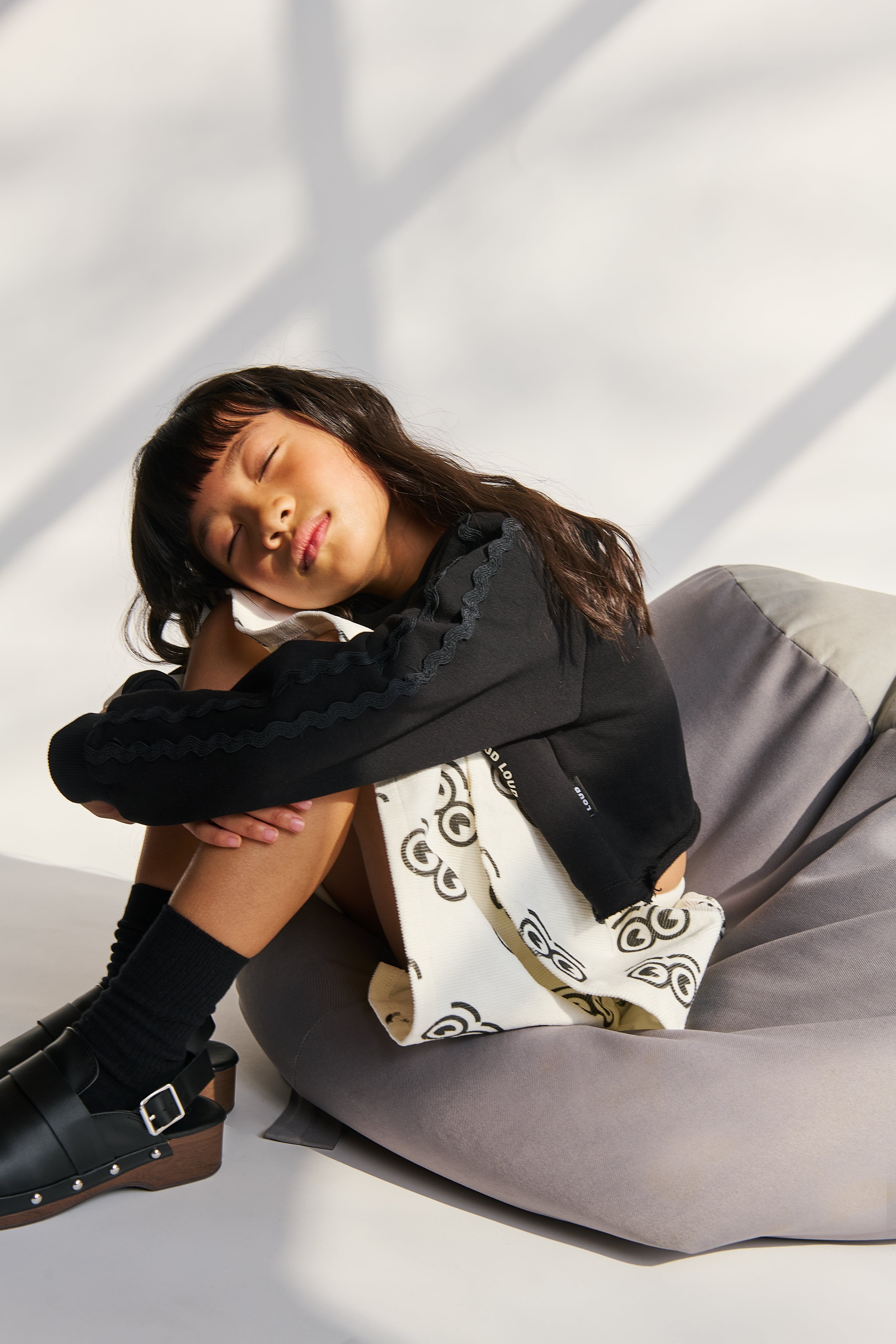 LOUD APPAREL "NURTURE" LOGO EYES ALLOVER PRINT SKIRT