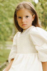 LITTLE TEMPEST TAFFETA SMOCKED GOWN